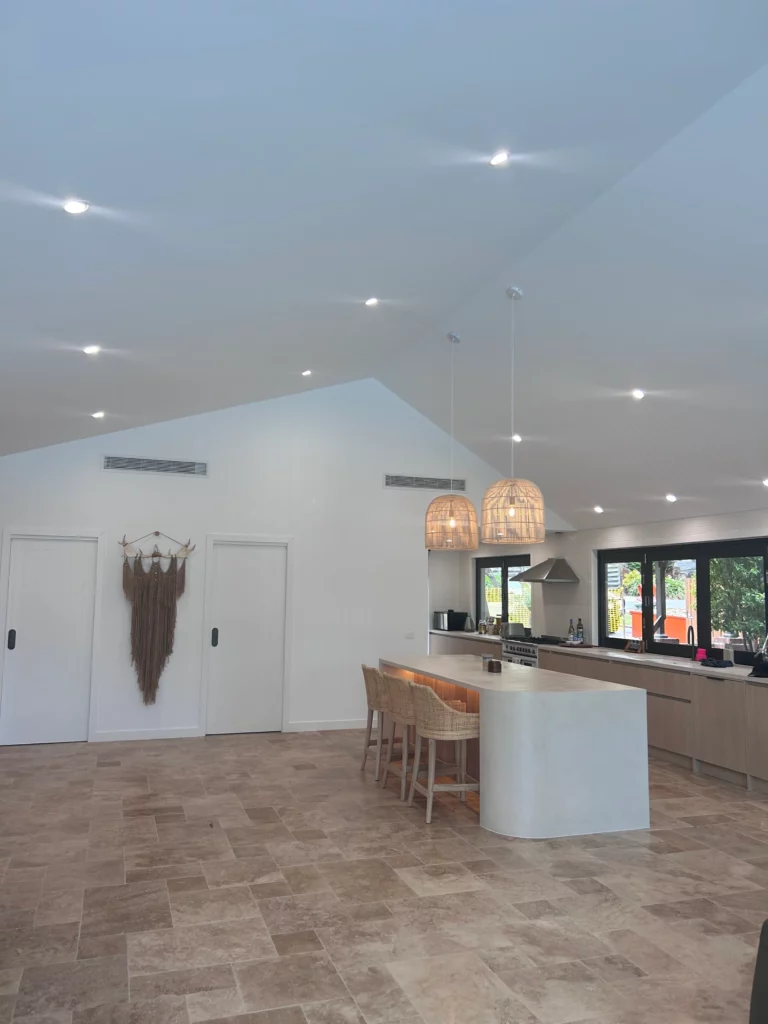 Modern kitchen island with pendant lights